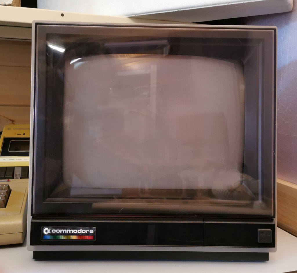 Commodore 64 computer, floppy drive, cassette speler, handleiding, joystick, monitor